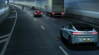 Vehicles driving through the tunnel of the A24